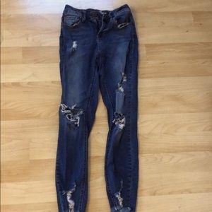 American rag size 0 jeans with rips. High/mid rise